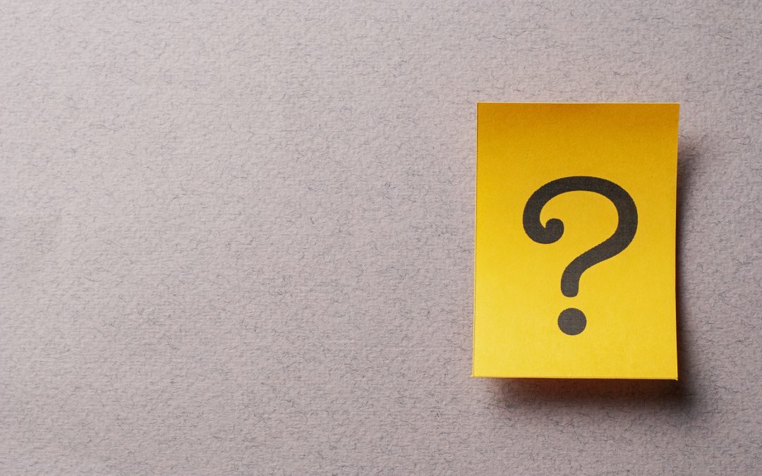 Colorful yellow card with printed question mark