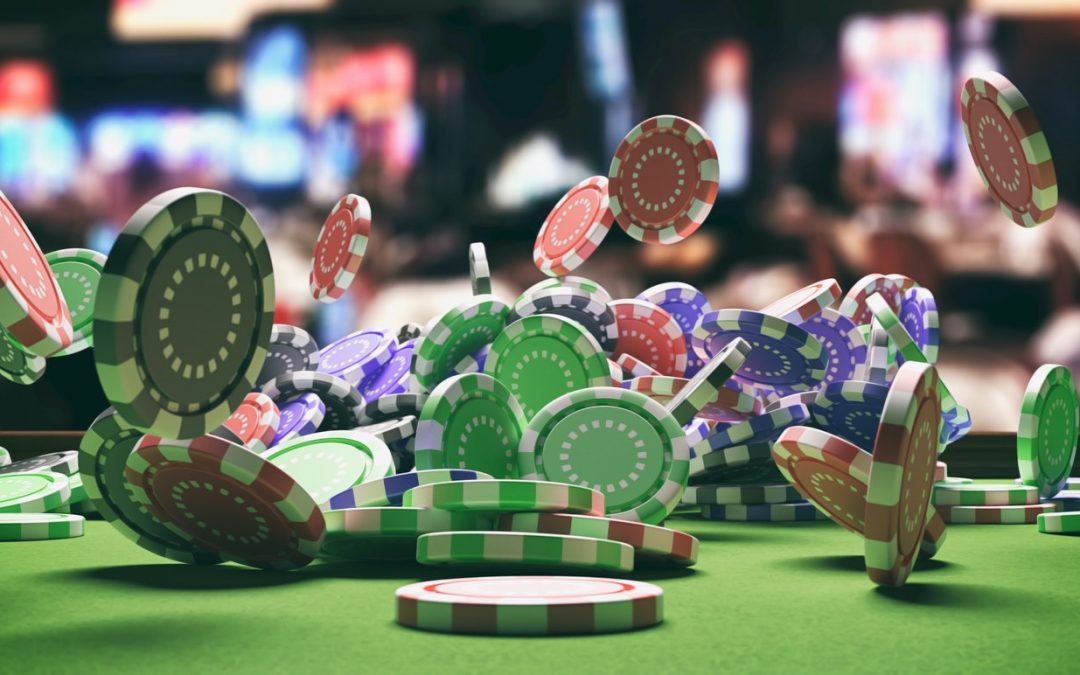 Poker chips falling on green felt roulette table, blur casino interior background. 3d illustration